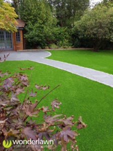 an artificial grass installation in Surrey with path